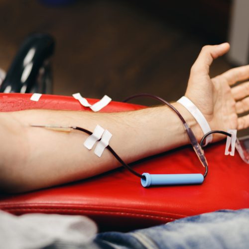 The donor blood donates blood in the clinic The donor blood donates blood in the clinic on a special chair. Blood sampling procedure for blood bank